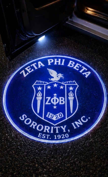 Zeta Phi Beta crest projected on pavement