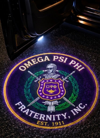 Omega Psi Phi crest projected on pavement