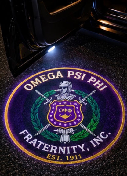 Omega Psi Phi crest projected on pavement